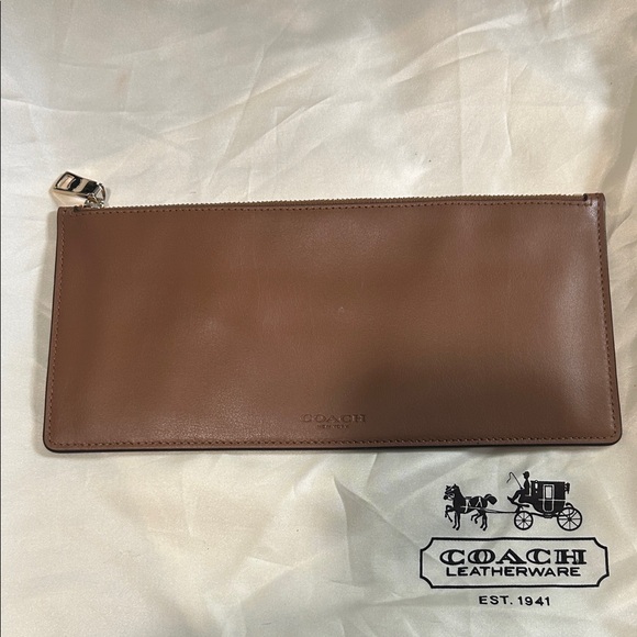 Coach Handbags - Coach slim Tan Leather Clutch